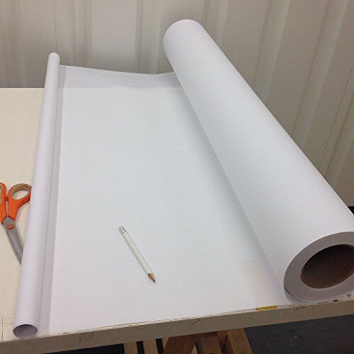 Measuring the width of the pattern cutting tracing paper.