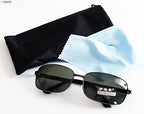 Driving sunglasses displayed at an angle to show the lenses