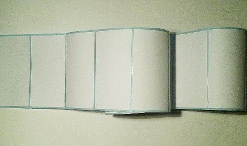 Pack of 2 rolls of self-adhesive labels displayed