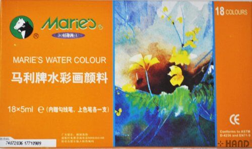 Close-up of Marie's vibrant watercolour paints in assorted colours