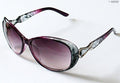 Two pairs of ladies fashionable sunglasses in assorted colours.