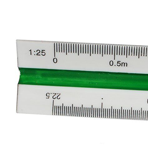 Triangular scale ruler placed on a drafting table