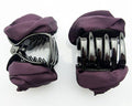 Dark purple satin rose bulldog hair clip on a white background