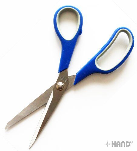K19 scissors displayed on a craft table, highlighting their ergonomic design.