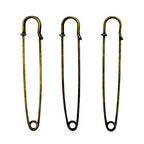 Kilt pins in use on a skirt, showcasing their elegant design.
