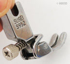 Sewing machine with gathering foot attached, demonstrating use