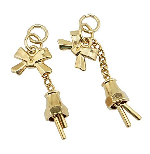 Gold tone decorative bow and bell pendant charm on a white background.
