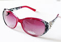 Two pairs of fashionable ladies sunglasses in assorted colours.