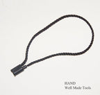 Close-up of nylon string snap lock mechanism