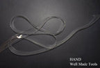 Clear flat crystal shoulder strap on a white background.