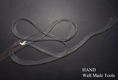 Close-up of the crystal detailing on the shoulder strap.
