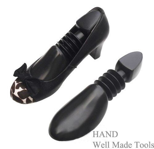 Pair of ladies' shoe expanders in a wooden finish