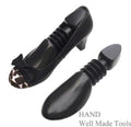 Pair of ladies' shoe expanders in a wooden finish