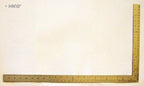 Ruler being used for measuring fabric in a sewing project