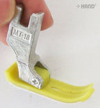 Teflon foot installed on an industrial sewing machine