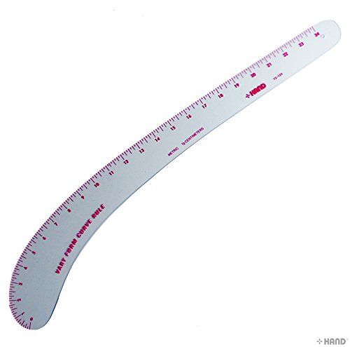 Flexible metric vary form curve ruler displayed on a table