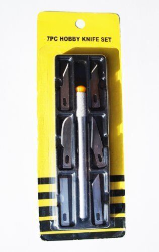 Close-up of the hobby knife set showing the blades and handle.