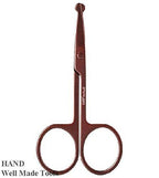 Close-up of round head scissors designed for facial hair trimming.