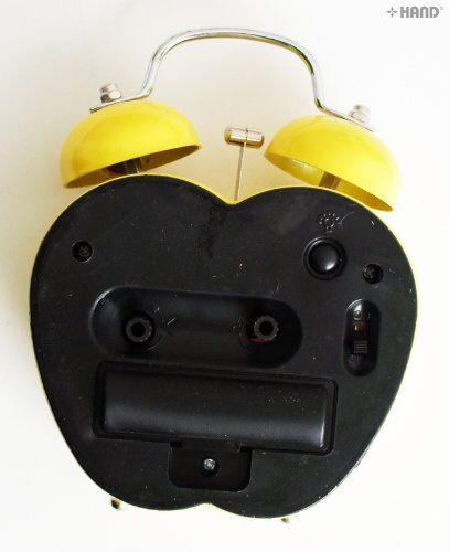 Close-up of the apple-shaped alarm clock face