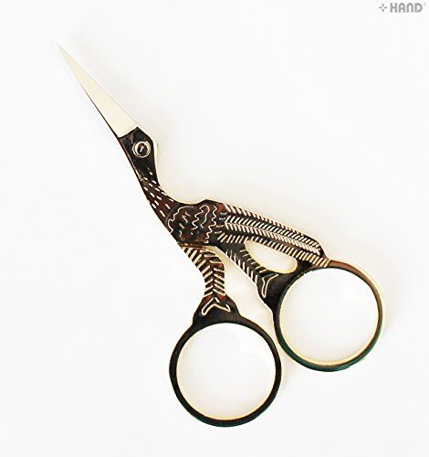 Side view of the 9cm gold plated embroidery scissors.