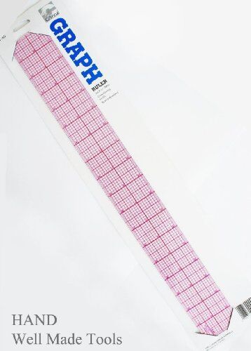 Graph Ruler B-85 placed on a crafting table with tools
