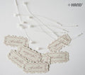 Off-white paper tags with 'fashion' printed in brown.