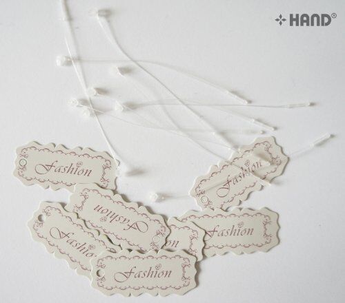 Off-white paper tags with 'fashion' printed in brown.
