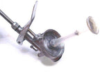 Close-up of the oil injection gun showcasing its nozzle and design.