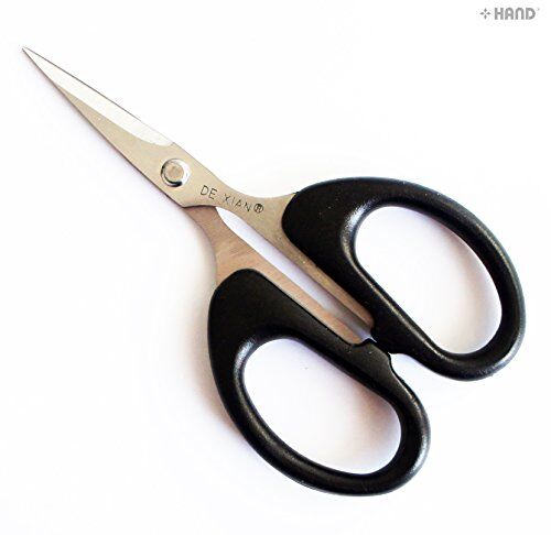5" industrial scissors displayed on a cutting mat.