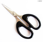 Close-up of 5" heavy duty industrial scissors with sharp blades.