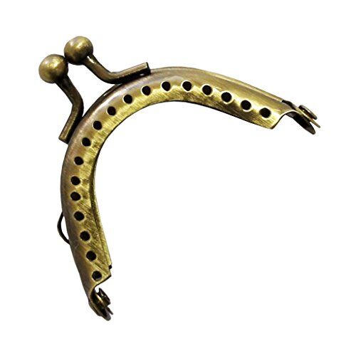 Small antique bronze purse frame with arched ball clasp.