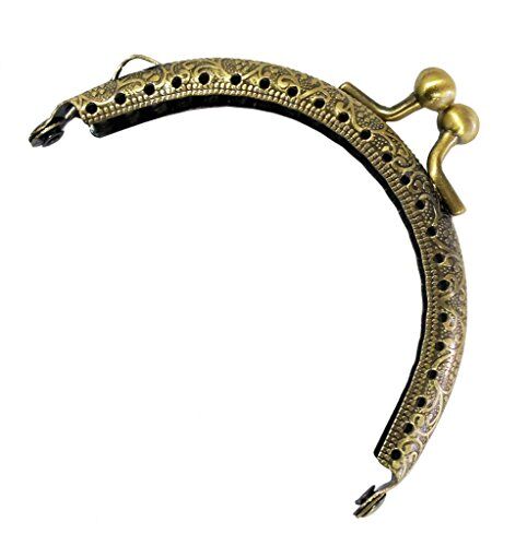 Antique bronze purse frame with engraved flowers design.