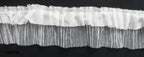 Close-up of black ruffle net trim showing texture and design