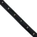 Black leatherette strap featuring dark copper coloured square studs.
