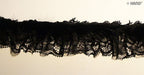 Full length view of 5 metres of black rabbit fur lace trim