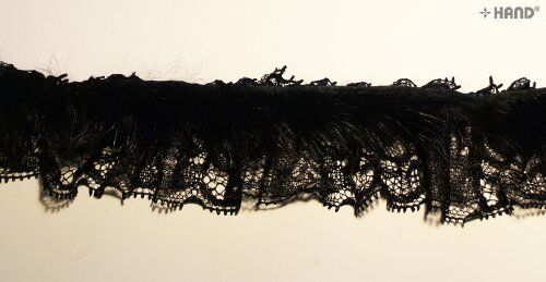 Full length view of 5 metres of black rabbit fur lace trim