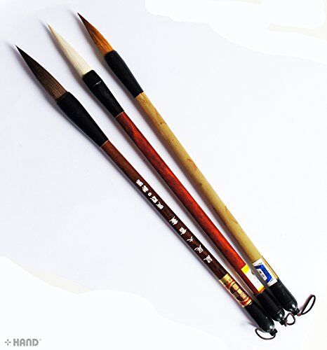 Three assorted sizes of Comfort to Hold Sumi brushes.