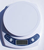 Close-up of the scale's control buttons and display.