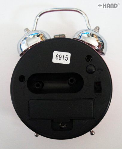 Clock displayed on a bedside table in a child's room