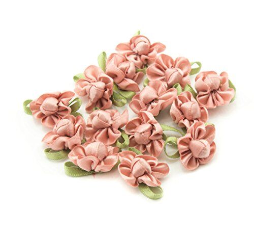 Pastel pink ribbon bow sew on trim with fabric flower detail.