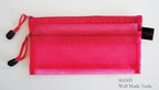 Pencil pouch filled with pens and pencils for easy access.