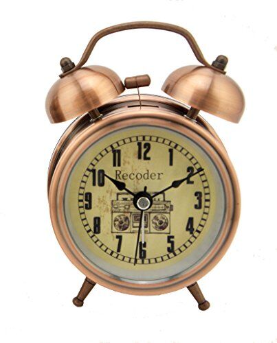 Alarm clock with night light feature in a dark setting
