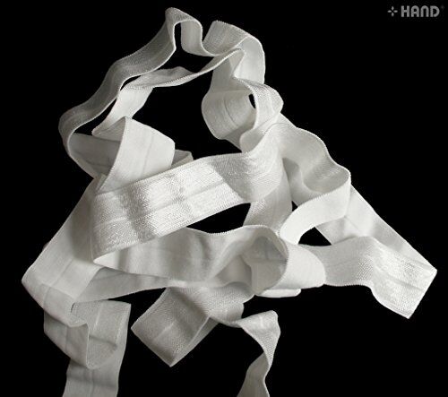 Close-up of 20mm wide off white elastic for sewing projects