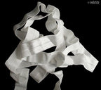 Close-up of 20mm wide off white elastic for sewing projects