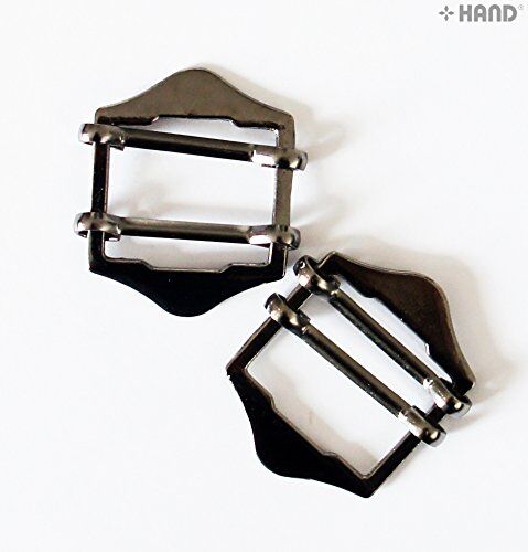 Shoe handbag buckle in gunmetal tone, showcasing its fastening design.