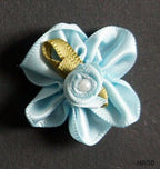 Variety of flower trims in different colours for crafting