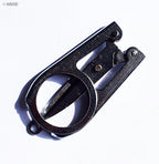 Close-up of the cutting edge of the large scissors