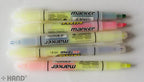 Highlighters arranged neatly in a row for display.