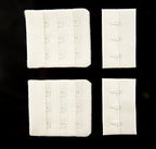 Two sets of 45 mm wide white bra hook and eye fasteners