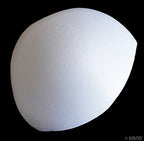Close-up view of the white bra pads showing texture and shape.